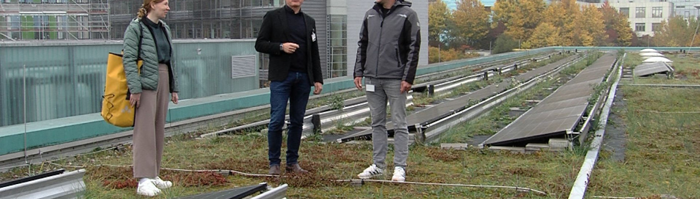 Klinikumsvertreter und Solarpaneelen auf dem UKT | Bildquelle: RTF.1